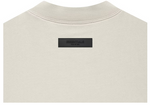 Load image into Gallery viewer, Fear of God Essentials Relaxed Crewneck Wheat
